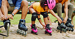 Rollerblade, parents and girl in park, family and bonding together with hobby. Outdoor, mother or father with daughter, skates or safety with active fun, tying laces or straps with support or helmet