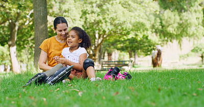 Buy stock photo Rollerskate, hobby and mother with daughter in park for support, smile or skating game. Rollerblade, happiness and summer vacation with woman and child in nature for bonding, relax and family holiday
