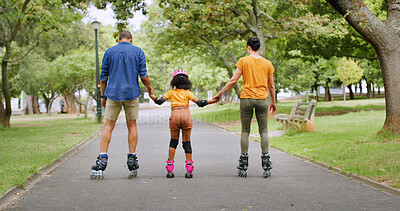 Buy stock photo Roller skating, holding hands and back of family in nature on holiday, getaway or weekend trip with balance. Support, safety and people with skates for hobby together outdoor in park on vacation.