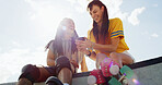 Friends outdoor, laughing and roller skate with phone, social media and funny skating fail video. Low angle, flare or happy people with tech at skatepark for internet humor, online comedy or bonding.