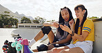Friends outdoor, relax and roller skate with phone, website and shock for viral social media video. People, bonding and surprise with tech at skatepark for internet search, connection and blog post.