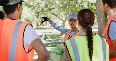 Buy stock photo Woman, people and volunteer in meeting, park or planning with talk, speech and accountability with cleaning. Team, explain and point for waste, discussion or call to action for sustainable nonprofit