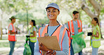 Volunteer, woman and happy with clipboard at park for cleanup charity, green project and activism. NGO portrait, team leader and checklist in nature for sustainable outreach and social responsibility