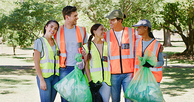 Buy stock photo Volunteer, cleaning and people in park with bag to collect trash, plastic and litter for pollution. Portrait, team and men and women for community service, recycling and environmental care outdoor