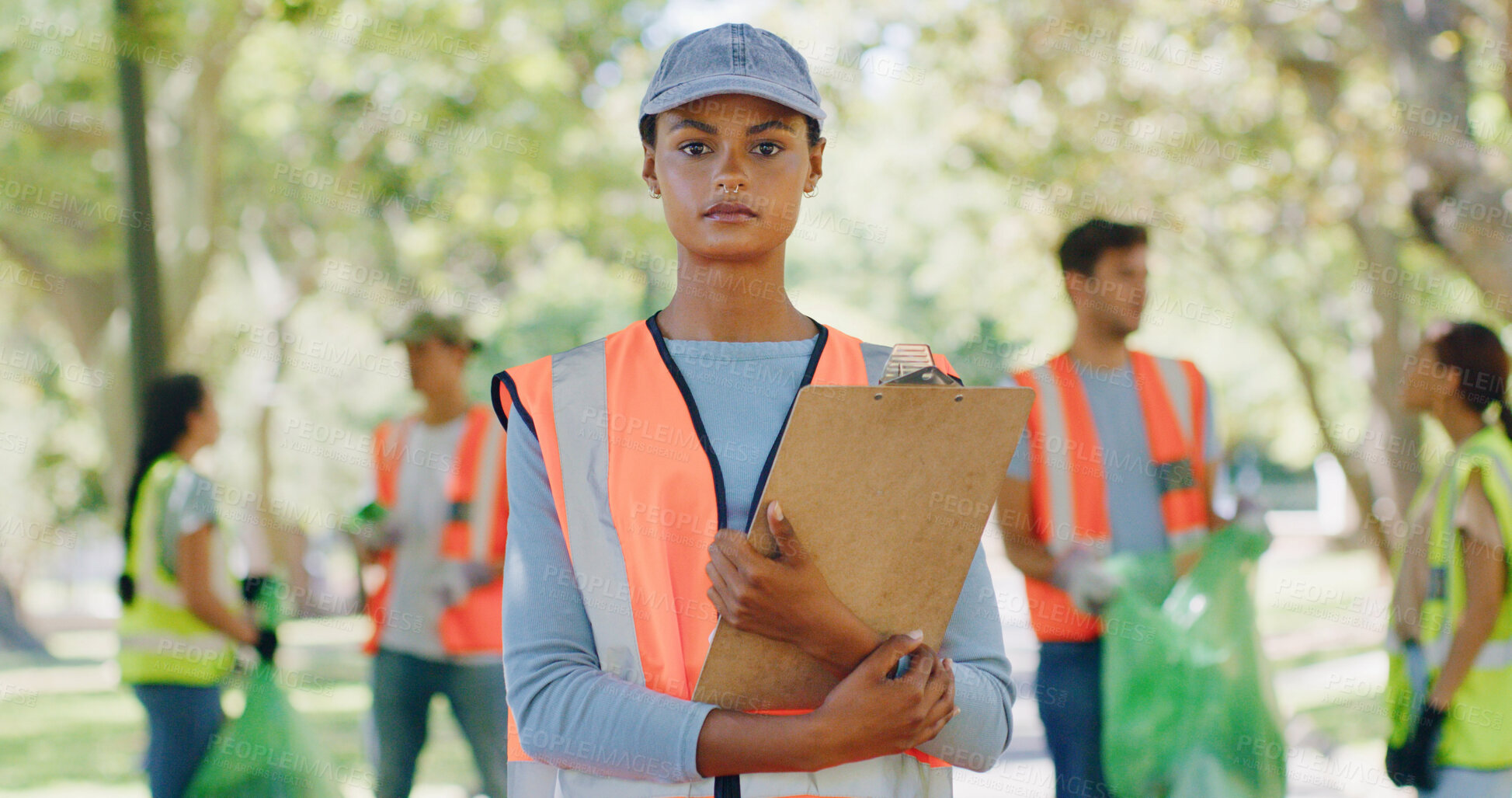 Buy stock photo Serious volunteer, woman or clipboard at park for waste picking, green project or community service. Sustainable NGO, team leader or workflow checklist for environmental outreach or activism portrait