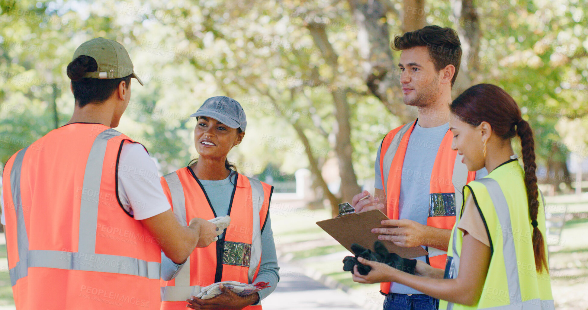 Buy stock photo Group, people and volunteer at park for sign up on clipboard, planning or accountability. Team, men and women for talk, happy or gloves for registration process with call to action for sustainability