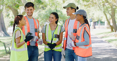 Buy stock photo Group, people and volunteer in meeting at park for planning with discussion, speech or smile for accountability. Team, men and women for talk, happy and info for call to action for sustainability