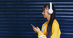 Streaming, choice and girl with headphones, radio and podcast selection in digital entertainment. Space, gen z and female person with phone, playlist option or listening with music subscription.