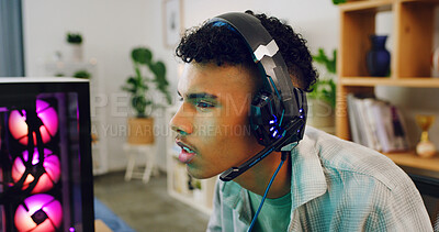 Buy stock photo Boy, gamer and playing headset for esport, competition or streaming gameplay in home. Serious, teenager or streamer with mic for competitive online match, network or entertainment connection in house