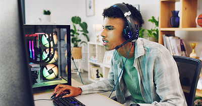 Buy stock photo Gamer, computer and teen with headphones in home for esports competition, action or contest. Headset, boy and gaming with pc for gameplay challenge, online match or streaming entertainment with RGB