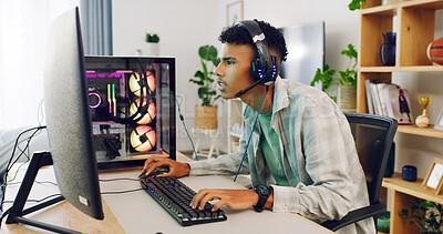 Buy stock photo Gaming, computer and teen with headphones in home for esports competition, action or contest. Headset, boy and gamer with pc for gameplay challenge, online match or streaming entertainment with RGB