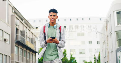 Buy stock photo Phone, thinking and walking with teen boy in city for commute to high school destination. App, smile and space with happy student typing outdoor in urban town for communication, education or travel