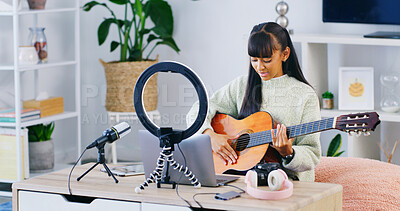 Buy stock photo Girl, guitar teacher and influencer with laptop, home and recording video for content creation. Person, computer and teenager with ring light, play instrument and music tutorial on social network