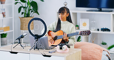 Buy stock photo Girl, guitar teacher and influencer with laptop, home and recording video for content creation on web. Teenager, computer and ring light with instrument, podcast and music tutorial on social network