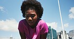 Tired, runner and black woman in city for rest, recovery and break for exercise, workout or training. Sports, outdoor and person with fatigue, sweat or health in town for fitness, wellness or running
