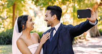 Buy stock photo Wedding, selfie and bride with groom in park for memory, post and social media for celebration. Marriage, love and happy man and woman with profile picture, photo and smile for romantic event outdoor
