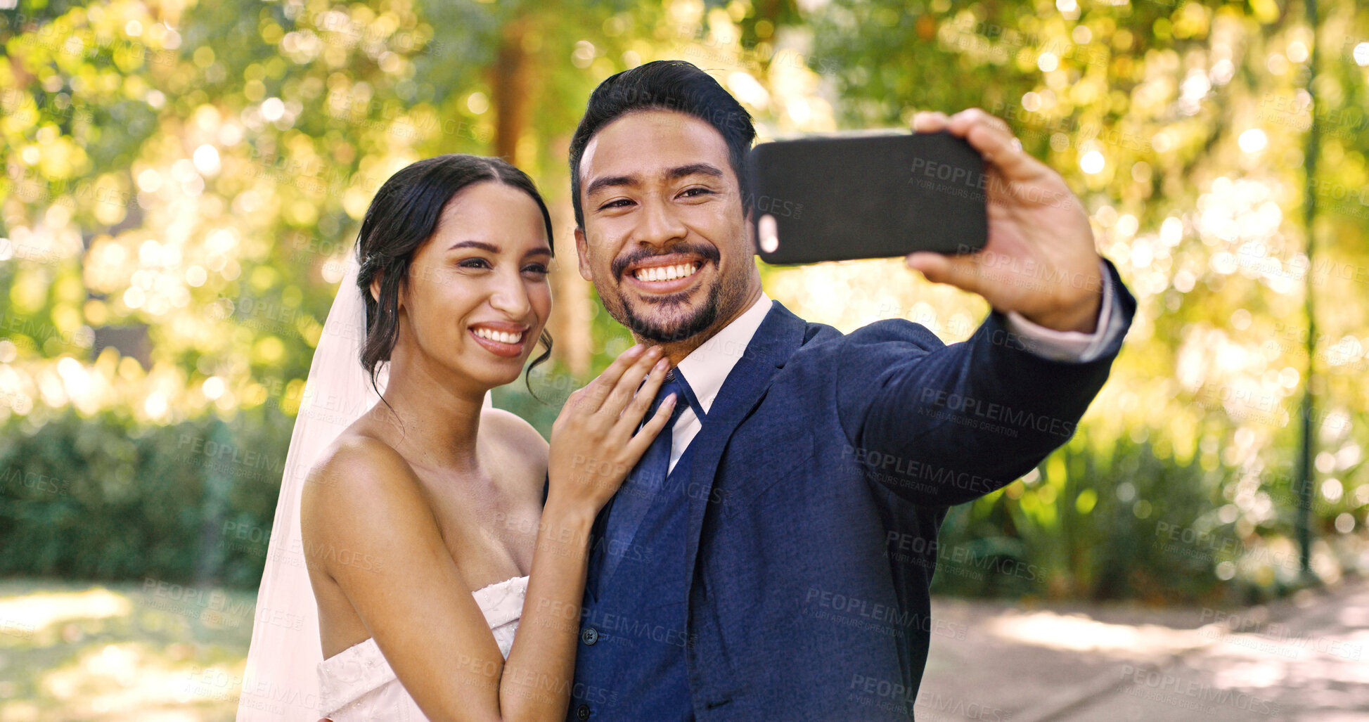 Buy stock photo Wedding, couple and selfie outdoor with smile for special memory, love and post for marriage. Man, woman and picture of bride with groom at park for social media profile, romance and commitment
