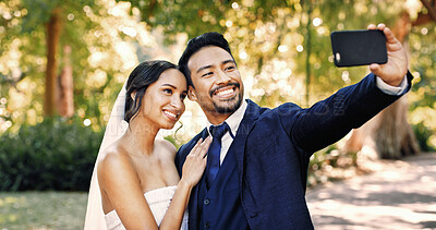 Buy stock photo Wedding, couple and selfie at park with smile for special memory, love and post for marriage. Man, woman and picture of bride with groom outdoor for social media profile, romance and celebration