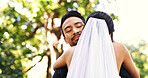 Wedding, couple and smile with hug in nature for marriage celebration, love commitment and loyalty. Happy people, bride and groom with embrace at ceremony for relationship union, connection and bokeh