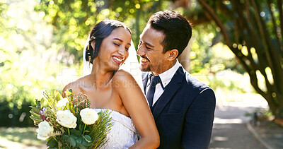 Buy stock photo Wedding, couple and smile with flowers at park for marriage ceremony, loyalty and love commitment. Happy people, bride and groom with celebration at reception for relationship union, bonding or bokeh