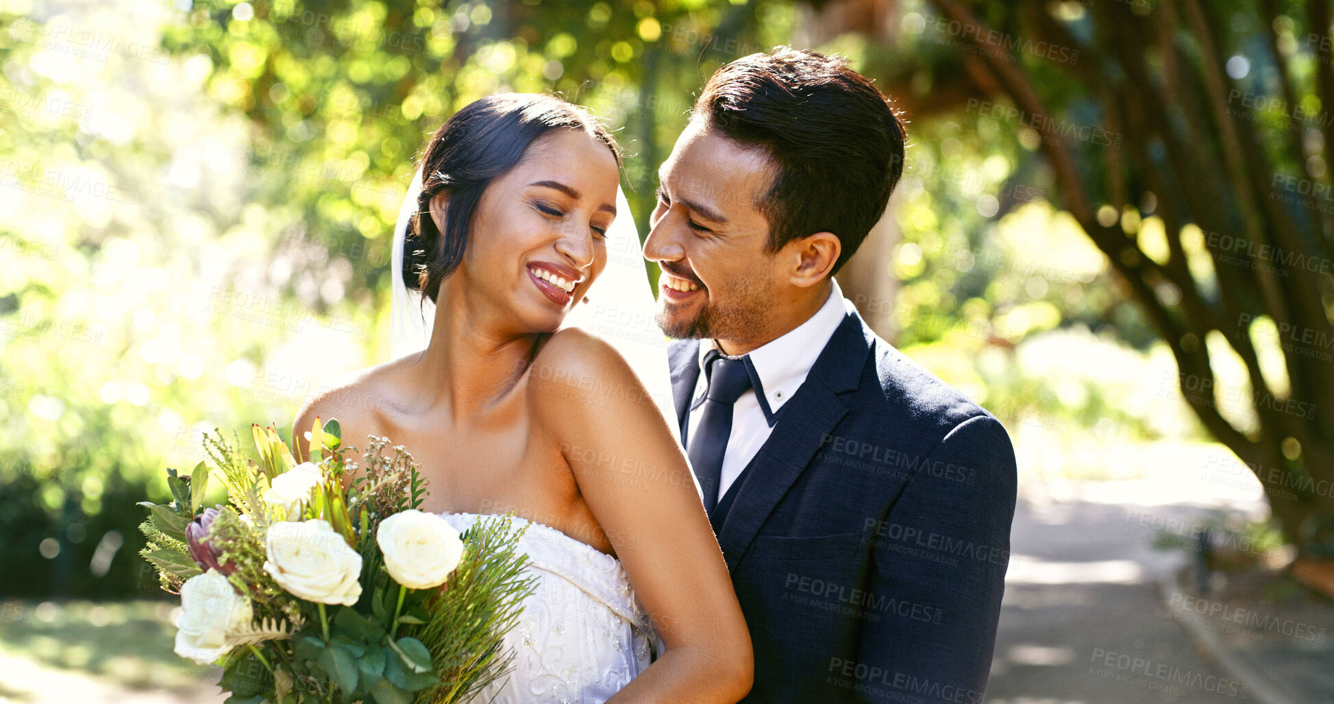 Buy stock photo Wedding, couple and smile with flowers at park for marriage ceremony, loyalty and love commitment. Happy people, bride and groom with celebration at reception for relationship union, bonding or bokeh