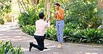Shocked, couple and proposal with ring outdoor for marry me gesture, engagement and save the date. Unexpected, people and partner with marriage promise, emotional reaction and relationship commitment