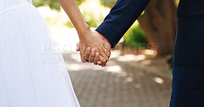 Buy stock photo Wedding, walking and couple in park holding hands for marriage, love and commitment for celebration. Affection, outdoor and bride and groom together for bonding, relationship and romantic event