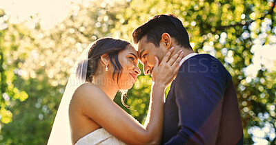 Buy stock photo Wedding, couple and love in park with nature, support and celebration for bridal union or marriage. Happy bride, groom and people touch in garden for life partner, commitment and together outdoor