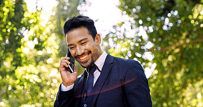 Buy stock photo Businessman, phone call and smile in park for networking, social contact and conversation. Happy, person and communication with technology outdoors for low angle, discussion and negotiation or deal
