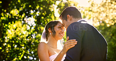 Buy stock photo Wedding, couple and smile in park with nature, support and celebration for bridal union or marriage. Happy bride, groom and people in garden low angle for life partner, commitment or together outdoor