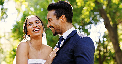 Buy stock photo Wedding, love and couple with laugh at park for marriage, celebration, funny joke and commitment. Happy people, bride or groom with comic connection at ceremony for relationship union, event or bokeh