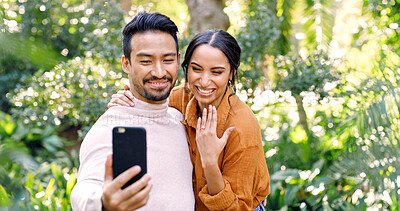 Buy stock photo Happy couple, engagement or video call with ring for good news, proposal or commitment together. Man, woman or lovers with smile or mobile smartphone for online conversation, marriage or relationship