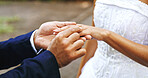 Wedding, ring and hands of couple outdoor for marriage, love symbol and commitment for celebration. Affection, nature and bride and groom with jewelry for bonding, relationship and romantic event