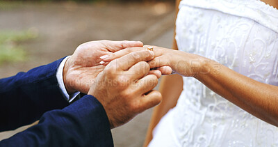 Buy stock photo Wedding, ring and hands of couple outdoor for marriage, love symbol and commitment for celebration. Affection, nature and bride and groom with jewelry for bonding, relationship and romantic event