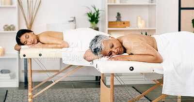 Buy stock photo Women, relax or sleeping with massage bed in spa for luxury body treatment, healing or zen in salon. Female people, asleep or holiday getaway together with comfort for beauty therapy or relaxation