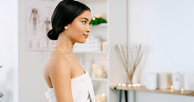 Buy stock photo Thinking, spa and woman in towel at resort for massage, skincare treatment and pamper for wellness. Space, salon and person with calm, peace and relax for aromatherapy, stress relief and health