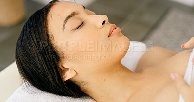 Buy stock photo Woman, relax and facial acupuncture in spa for beauty, stress relief and traditional Chinese medicine. Person, nap and rest at wellness resort with needle for skincare, ancient treatment and healing.