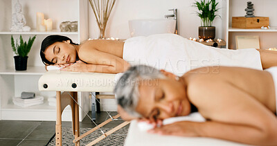 Buy stock photo Women, relax or therapy with massage bed in spa for luxury body treatment, healing or zen in salon. Female people, sleeping or holiday getaway together with comfort for beauty session or relaxation