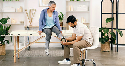 Buy stock photo Foot pain, physiotherapy and man with mature woman for consulting, wellness and rehabilitation. Healthcare, chiropractor and physical therapist with person for medical support, recovery and help