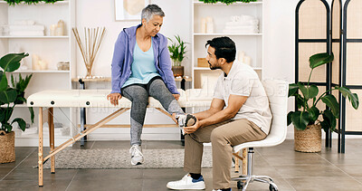 Buy stock photo Physiotherapy, foot exam or woman in clinic for checkup, help or service in rehabilitation. Healthcare, mature client or chiropractor in center with consultation, injury or visit for muscle recovery.