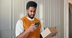 Box, delivery and phone with angry man in home for ecommerce, online order or shipping problem. App, negative review and package with annoyed customer in apartment for feedback or logistics delay