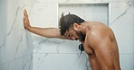 Man, shower and hygiene with morning routine in home, bathroom and water drops for cleaning body. Person, shirtless and wash for grooming, self care and healthy skin with wellness at apartment