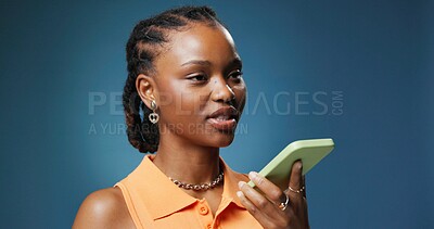 Buy stock photo Phone call, thinking and voice with black woman in studio for communication, feedback or solution. Conversation, explain and idea with African person on blue background for mobile update or planning