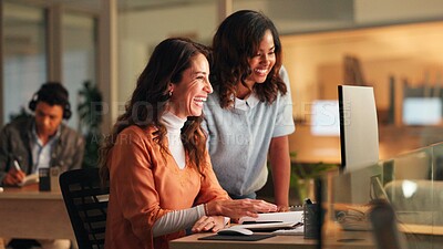 Buy stock photo Computer, discussion and businesswomen in office at night with creative project in collaboration. Feedback, tech and female manager with magazine editors for advice on article for publishing deadline