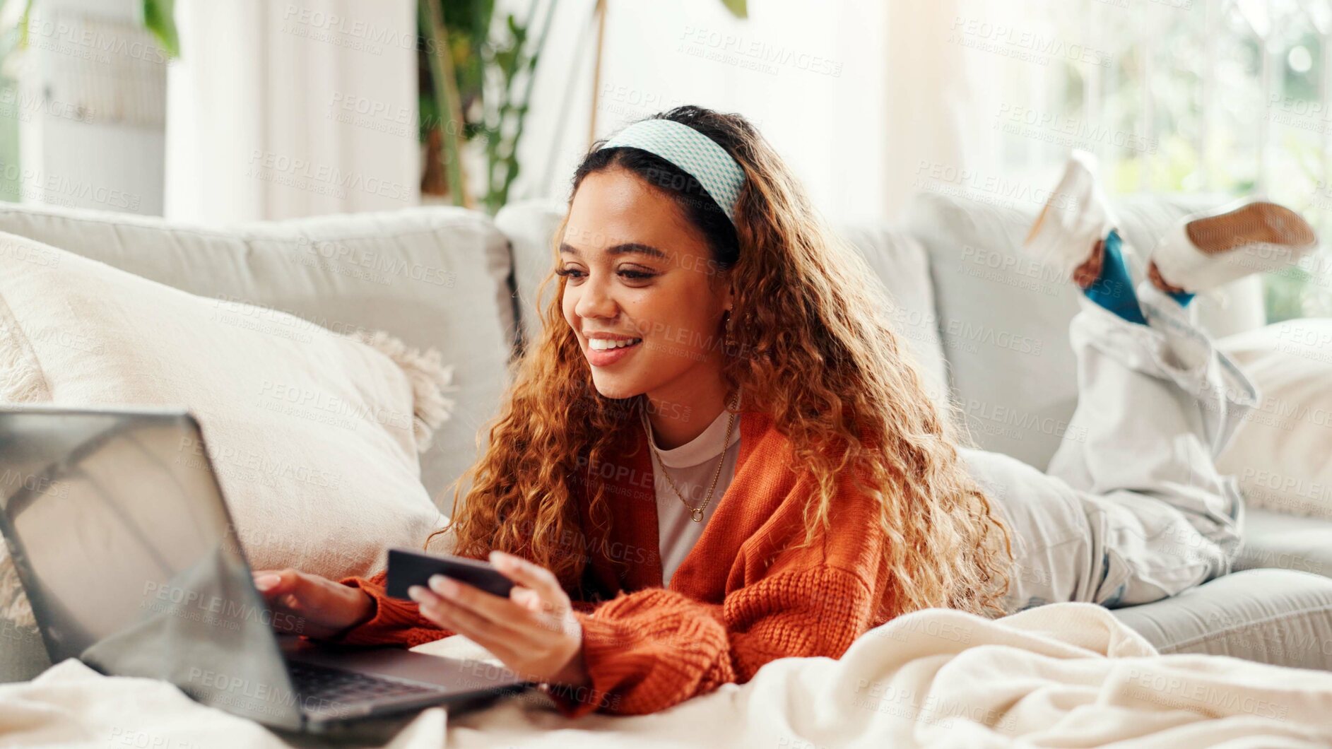 Buy stock photo Credit card, laptop and relax with woman on couch for online shopping, ecommerce and sale. Digital payment, banking website and person in living room of home for deal, transaction or subscription