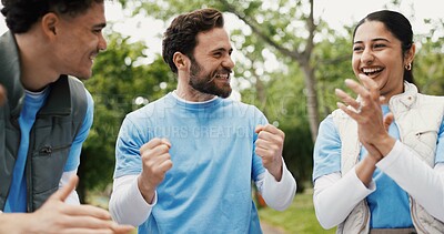 Buy stock photo Applause, fist pump and volunteer people outdoor for food drive celebration, motivation or success. Charity, smile and support with excited friends clapping in park together for community outreach