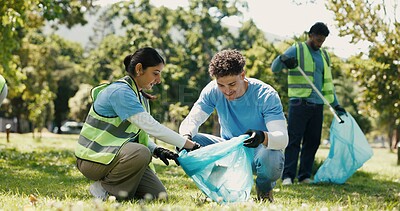 Buy stock photo Team, volunteer and cleaning outdoor with trash bag for sustainability, conservation or ngo. Happy people, help and pick up garbage for community service, recycle or earth day with waste management