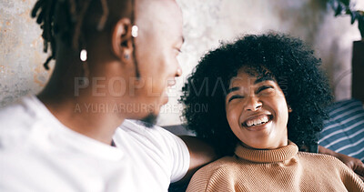 Buy stock photo Home, funny and couple with love, relax and bonding together with smile, talking and relationship. Laughing, happy man and woman on sofa, comfort and humor with trust, conversation and care in lounge