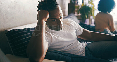 Buy stock photo Frustrated man, fight or ignore with couple on sofa for argument, dispute or toxic relationship. Male person, upset or angry with conflict or separation for divorce, disagreement or breakup in house