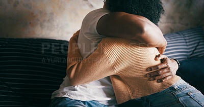 Buy stock photo Home, hug and couple on sofa, closeup and bonding together with care, love and relationship. Apartment, man and woman on couch, empathy and compassion with embrace, trust and support in living room